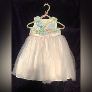 Beautiful white, pink, blue and green tulle dress.